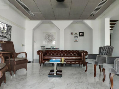 How to Style a Small Living Room Sofa Without Overcrowding the Room