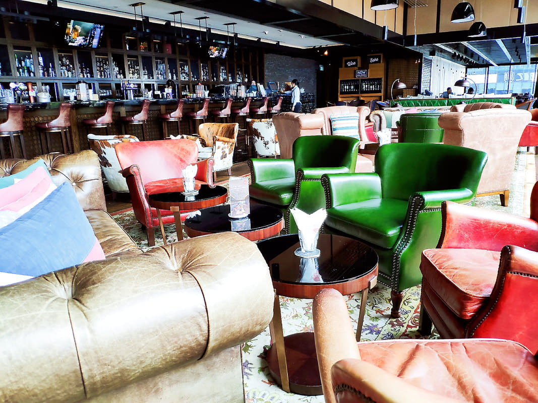 Leather Club Chairs at Cook & Brew Westin Hotel Singapore