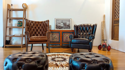 Leather Ottomans And Leather Armchairs