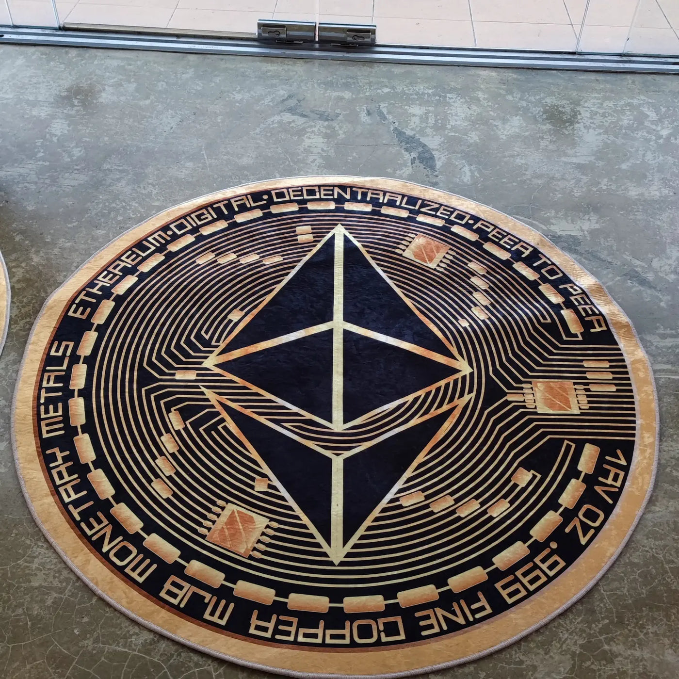 Ethereum mat. Imagine you are literally on top of Ethereum. Be in control. Introducing our Ethereum floor mat that glitters under the sun, reflective, gold, stunning. 